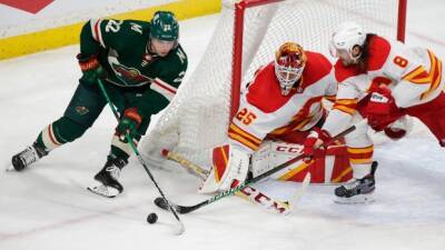 Red-hot Flames take down Wild again for 12th win in 13 - tsn.ca
