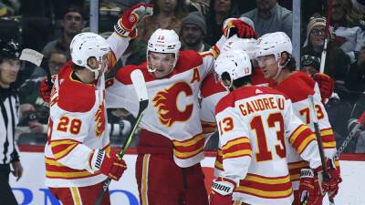 Flames take down Wild again for 12th win in 13 games - foxnews.com