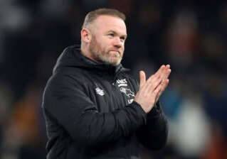 Wayne Rooney reacts after Derby County’s defeat to Cardiff City