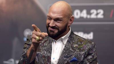 John Walton - Tyson Fury shows support for Ukrainian boxers taking up arms, says he'd fight if war came to UK - foxnews.com - Britain - Russia - Ukraine
