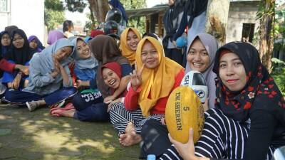 Muslim women boost cultural understanding of Australia through AFL training in Indonesia