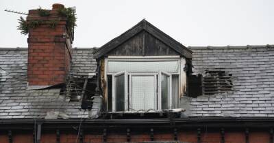 Firefighters scrambled to flat fire as images show roof badly damaged