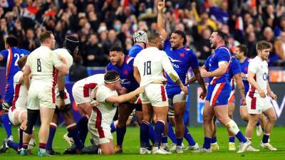 France clinch Grand Slam with victory over battling England in Paris