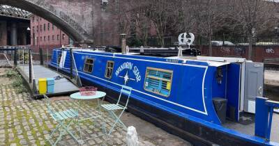 Cigars, an 'honesty bar' and a log burner... my quirky night sleeping on a boat in Manchester city centre