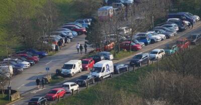Parking chaos at huge crowds flock to Dove Stone reservoir to enjoy weekend sun
