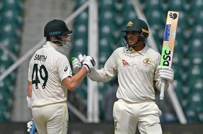 Khawaja , Smith miss milestones as Australia survive in Lahore