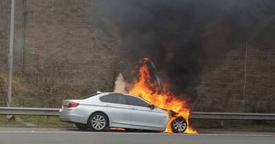 Firefighters rush to M62 after car bursts into flames