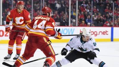 NHL roundup: Sharks hand Flames rare home loss