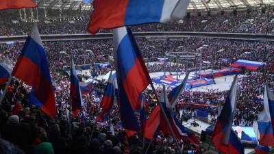 Russian Olympians face backlash after attending Vladimir Putin rally