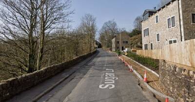 Man, 40, found dead in village after 'falling from a wooded area'