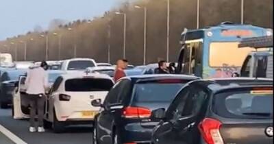 Drivers treat themselves to an ice cream in the MIDDLE of the M56 after becoming stuck in standstill traffic - manchestereveningnews.co.uk - county Cross