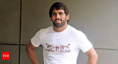 Bajrang Punia - Bajrang manages to prevail against fighting Rohit, secures 65kg spot in team for Asian Championship - timesofindia.indiatimes.com - Mongolia -  Tokyo - India