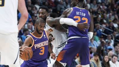 Chris Paul's back, Suns clinch top seed with win in Denver