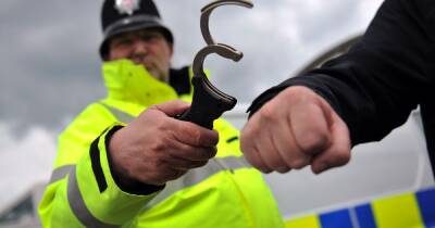 Man, 48, arrested after being found with knife and hammer in Wigan