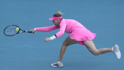 Russian Vera Zvonareva displays 'no war' message during her match against Danielle Collins at the Miami Open