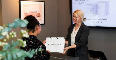 Holly Willoughby turns cashier as she goes for laid-back look to open her own pop-up shop