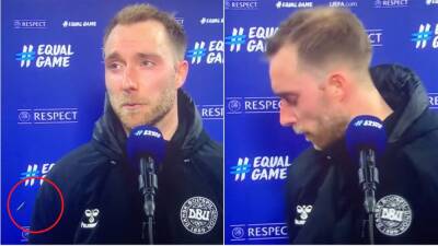 Christian Eriksen hit by coins during interview after dream return for Denmark