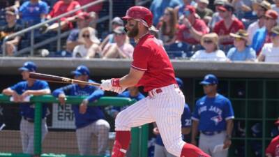 Harper homers twice as Philllies tops Blue Jays