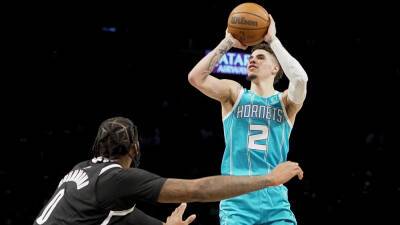LaMelo Ball scores 33 points, Hornets spoil Kyrie Irving's home debut