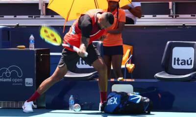 Nick Kyrgios - Carlos Bernardes - Kyrgios abuses umpire, poses for selfie and is docked a game in Miami Open defeat - theguardian.com - Italy - Australia - county Miami