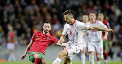 Soccer-Bruno Fernandes brace seals Portugal World Cup spot
