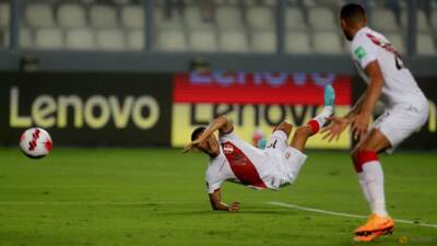 Andrew Downie - Peter Rutherford - Peru seal World Cup playoff berth with 2-0 win over Paraguay - channelnewsasia.com - Qatar - Usa - Australia -  Doha - London - Uae - Paraguay - Peru -  Lima