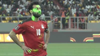 Mohamed Salah targeted by laser pointers during penalty shootout defeat to Senegal