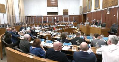 Council tax rise approved at rowdy town hall meeting where councillors shouted and traded nicknames
