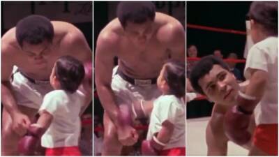 Muhammad Ali: Archive footage shows The Greatest playfighting with a little boy