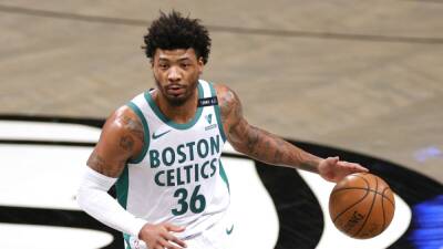 Marcus Smart - Marcus Smart: "Tengo trozos de cristal en mi mano, a veces ni la siento" - en.as.com -  Boston