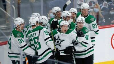 Robertson completes hat trick in OT as Stars down Jets
