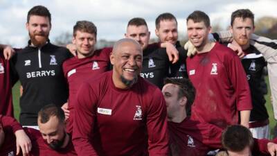 Roberto Carlos makes 'surreal' return to football for amateur English team - in pictures