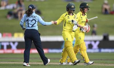 Australia hold off England at Cricket World Cup on a day for records