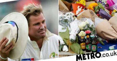 Australia cricket team pay tribute to Shane Warne as fans leave flowers, beer cans and cigarettes outside MCG
