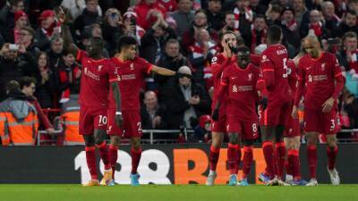 Liverpool close gap on Manchester City after edging past West Ham
