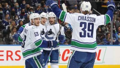 Canucks storm back in 3rd period to down Maple Leafs