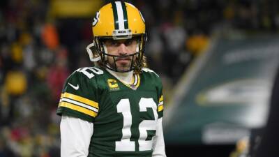 Free agency and trade buzz from NFL combine - Latest on Aaron Rodgers, Russell Wilson, QBs and risers in 2022 draft, franchise tags