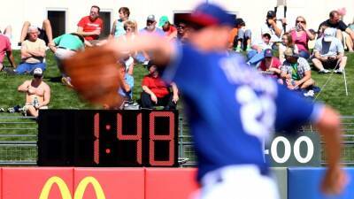 Sources - MLB eyes pitch clocks of 14 seconds with empty bases, 19 seconds with runners on