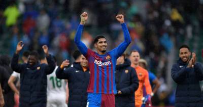 Soccer-Barcelona fight back to win at Elche