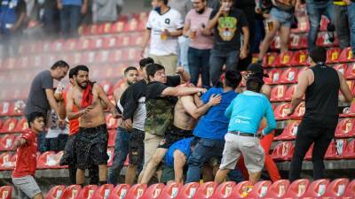 Massive brawl at Queretaro vs Atlas soccer match in Mexico leaves three in critical condition - abc.net.au - Mexico - Washington
