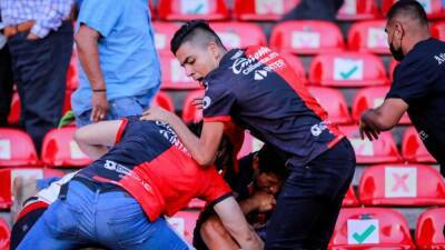Mexican soccer league suspends Queretaro matches after brawl injures 26 people