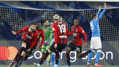 European round-up: Milan go top, Barca and Atletico win
