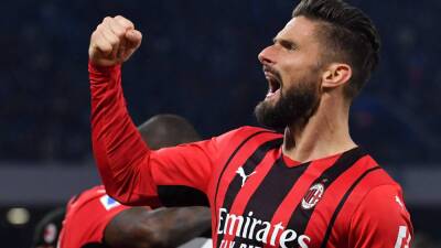 Olivier Giroud sinks Napoli to fire AC Milan top but cools talk of scudetto