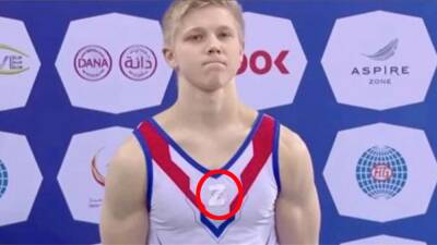 Russian gymnast Ivan Kuliak is being investigated for displaying 'shocking' war symbol on podium next to Ukrainian rival