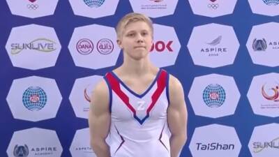 Larry Nassar - Russian gymnast Ivan Kuliak wears pro-war Z symbol on podium, standing next to Ukrainian competitor - abc.net.au - Russia - Qatar - Ukraine - Usa - Belarus -  Tokyo