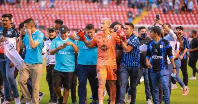 Queretaro coach Cristante claims players received death threats following fan violence in Liga MX game vs Atlas - msn.com - Argentina