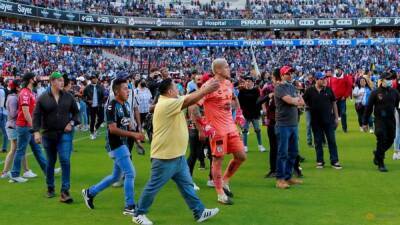 Mexican football league hits club with fan ban for brutal melee
