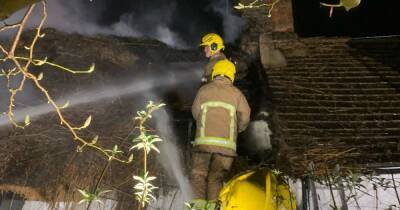 Fire breaks out in thatched roof of Bramhall property - latest updates - manchestereveningnews.co.uk - Manchester