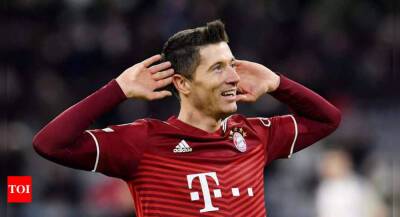 Bayern Munich storm into Champions League quarterfinals, led by Lewandowski's record hat-trick