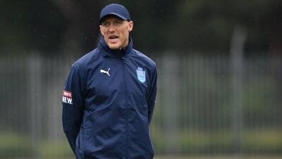 Cronulla Sharks NRL coach Craig Fitzgibbon to miss round-one match after positive COVID-19 test